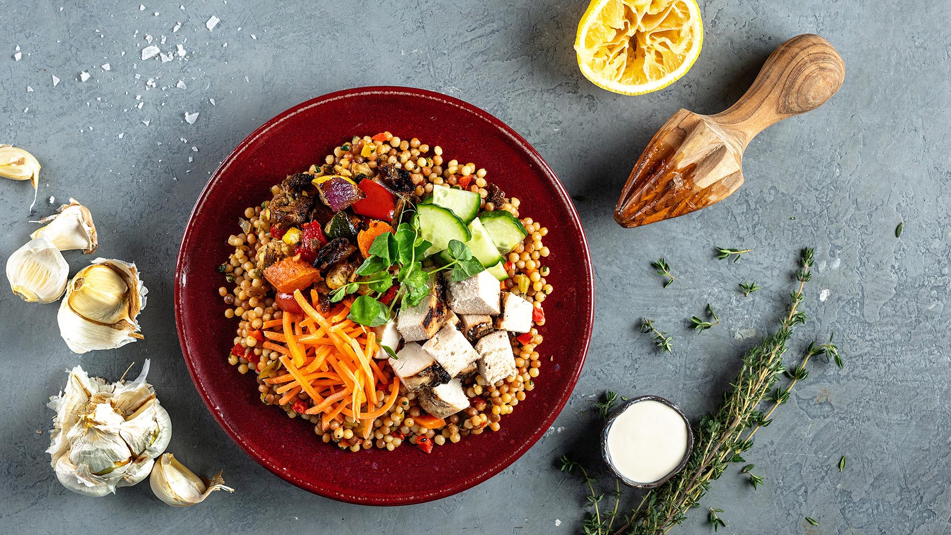 moroccan chicken and couscous bowl served